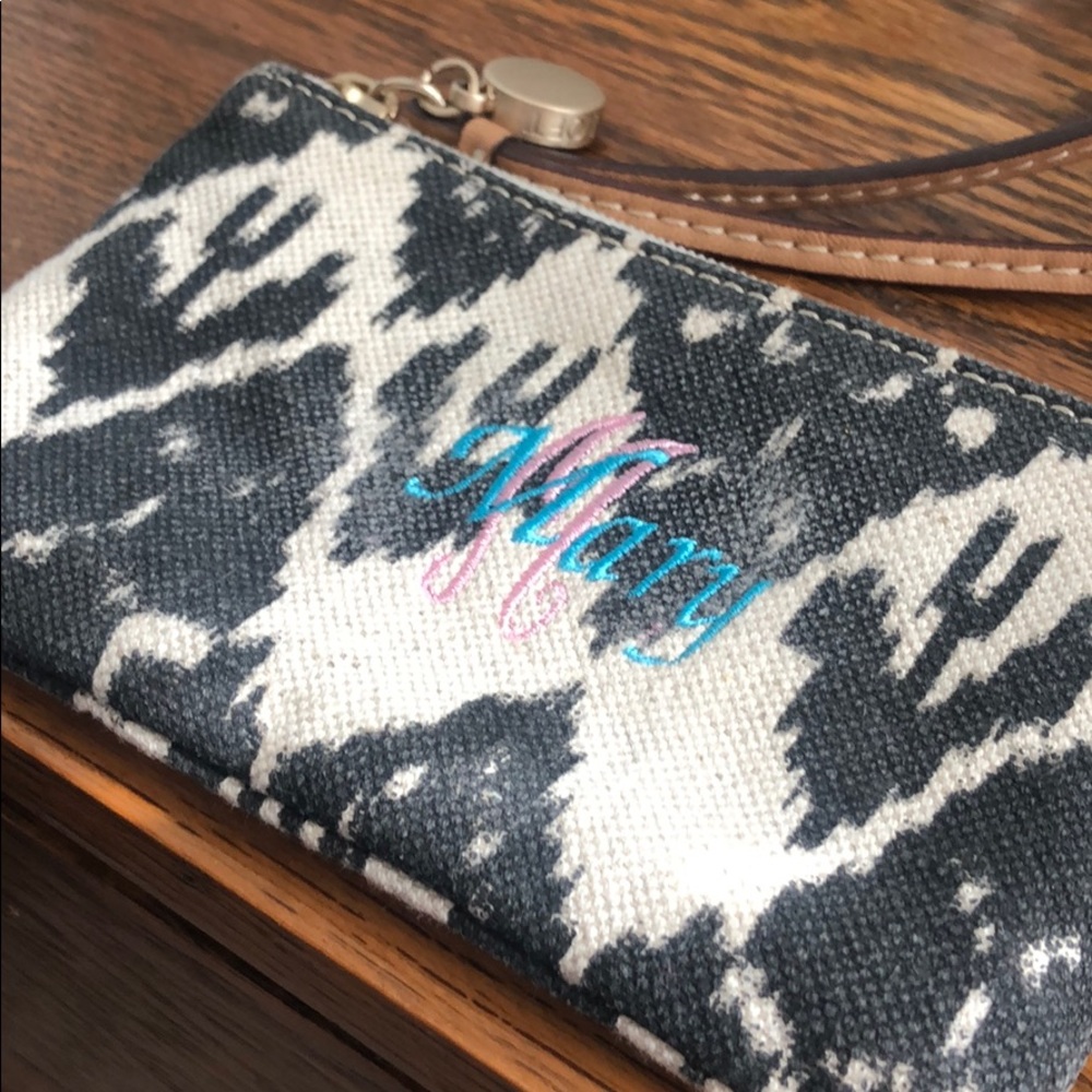 Never used monogrammed “Mary” wristlet